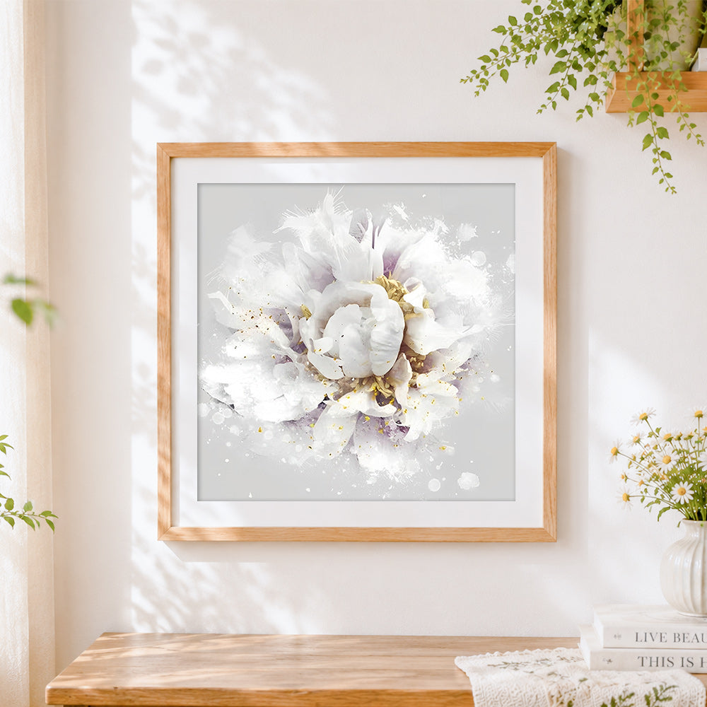 Finished white peony with gold leaf splatter cross stitch artwork displayed