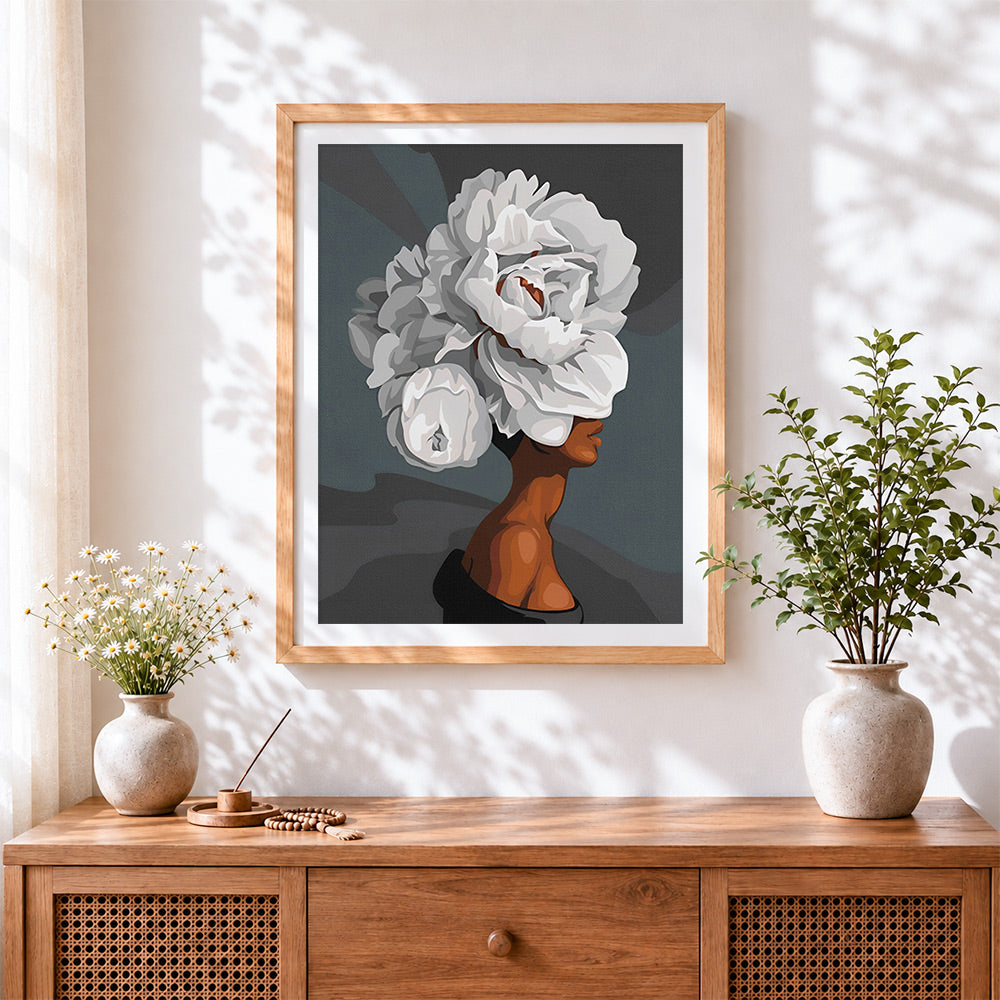 Finished white peony woman portrait cross stitch artwork displayed