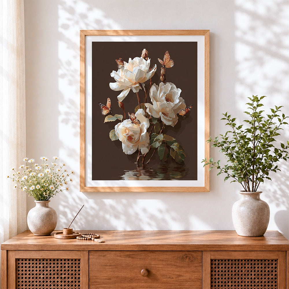 Finished white roses and butterflies on brown background cross stitch artwork displayed