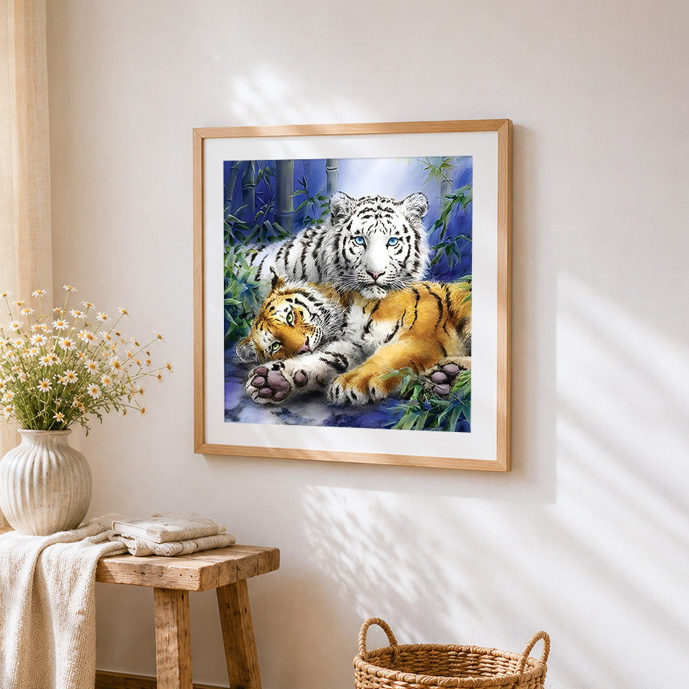 White tiger and bengal tiger in bamboo forest cross stitch artwork displayed on wall as home decor