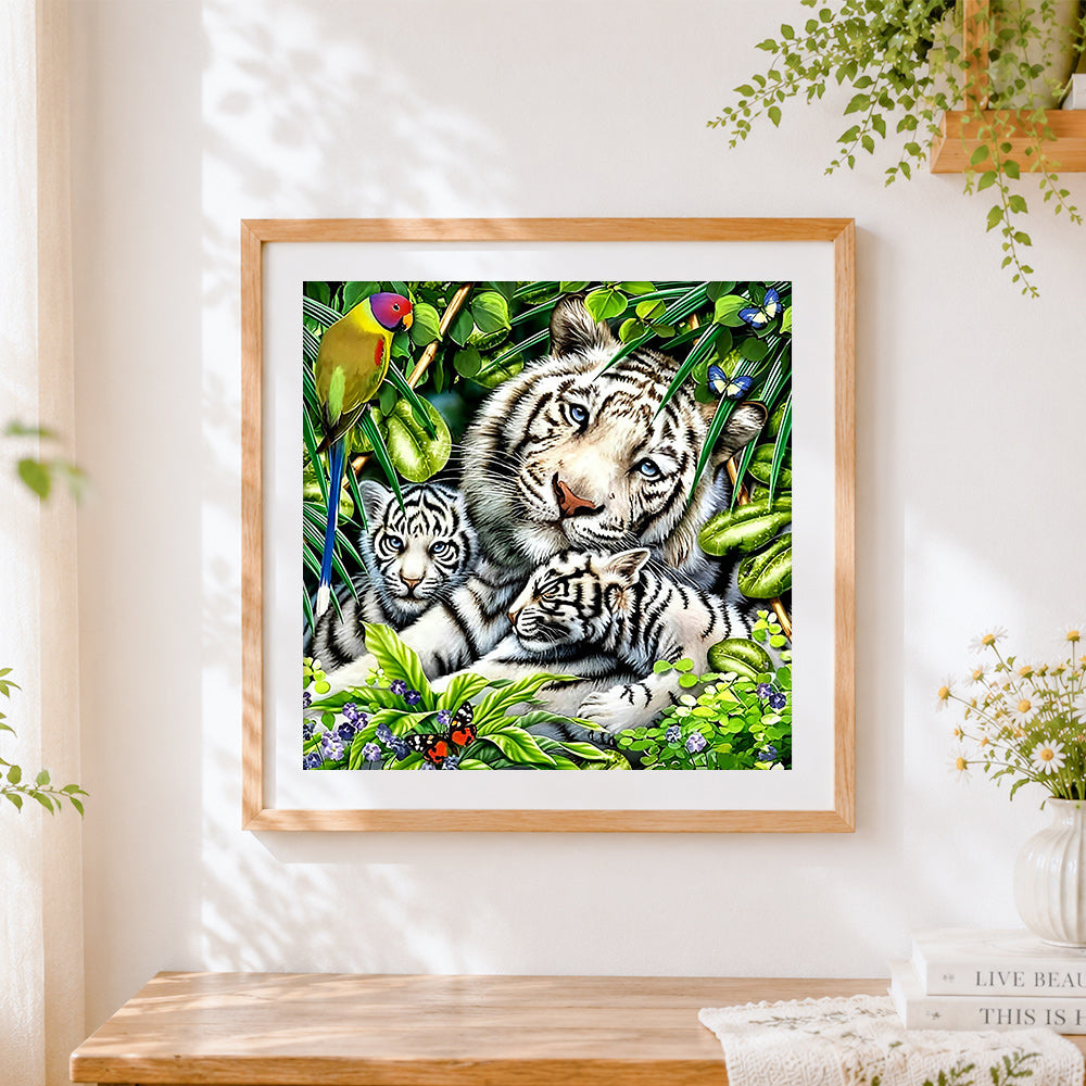 Finished white tiger family in tropical jungle cross stitch artwork displayed