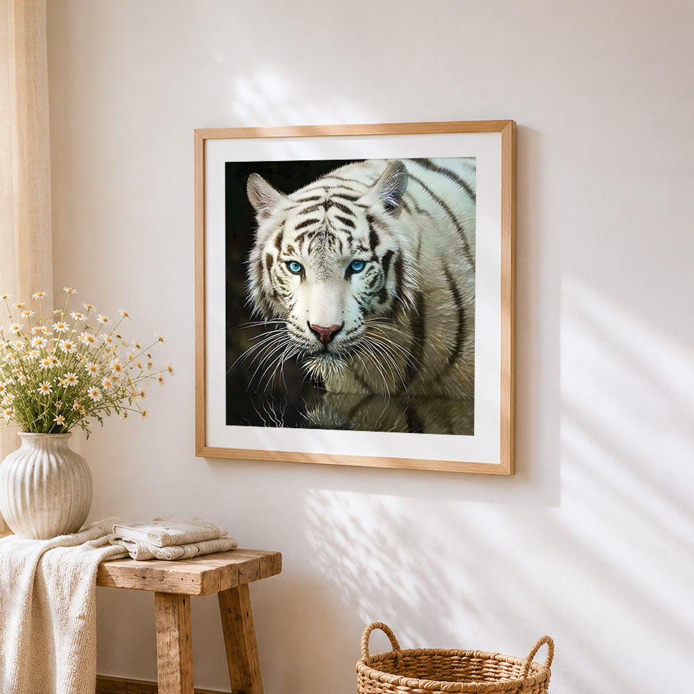 White tiger walking in water cross stitch artwork displayed on wall as home decor
