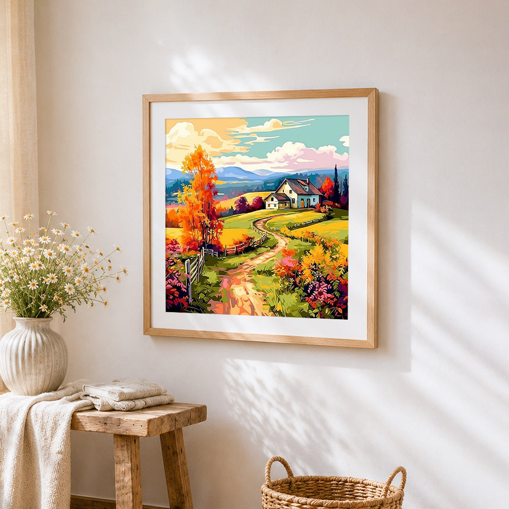 Winding autumn path to a farmhouse cross stitch artwork displayed on wall as home decor