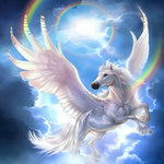 Winged unicorn flying through rainbow clouds cross stitch kit for beginners