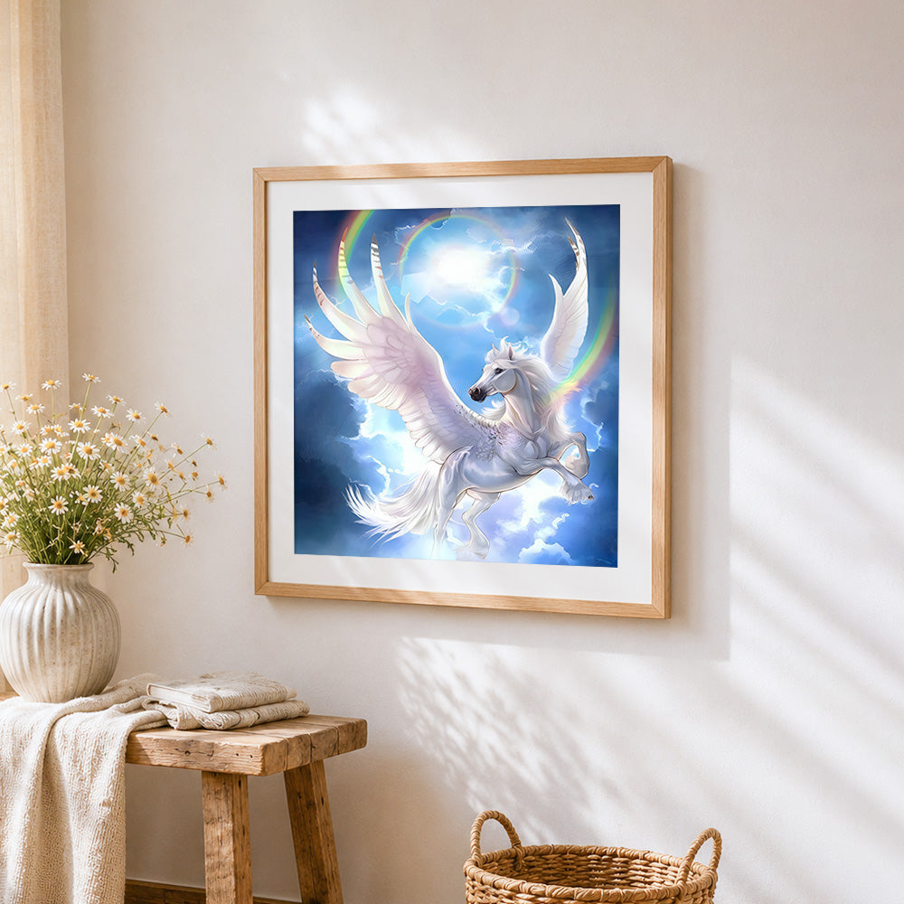 Winged unicorn flying through rainbow clouds cross stitch artwork displayed on wall as home decor