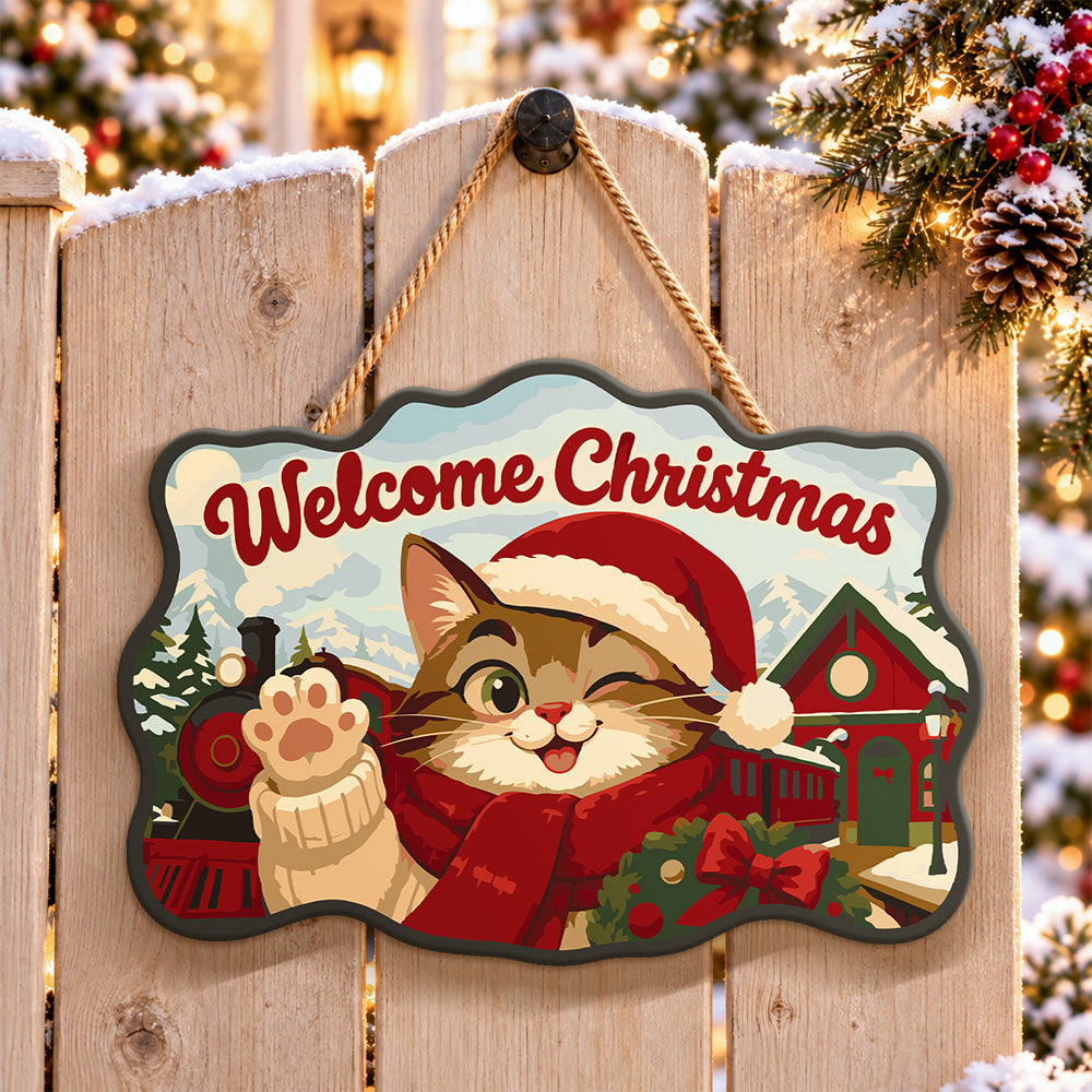 Winking cat and christmas train paint by numbers door hanger on a garden gate