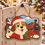 Winking christmas dog paint by numbers door hanger on a garden gate