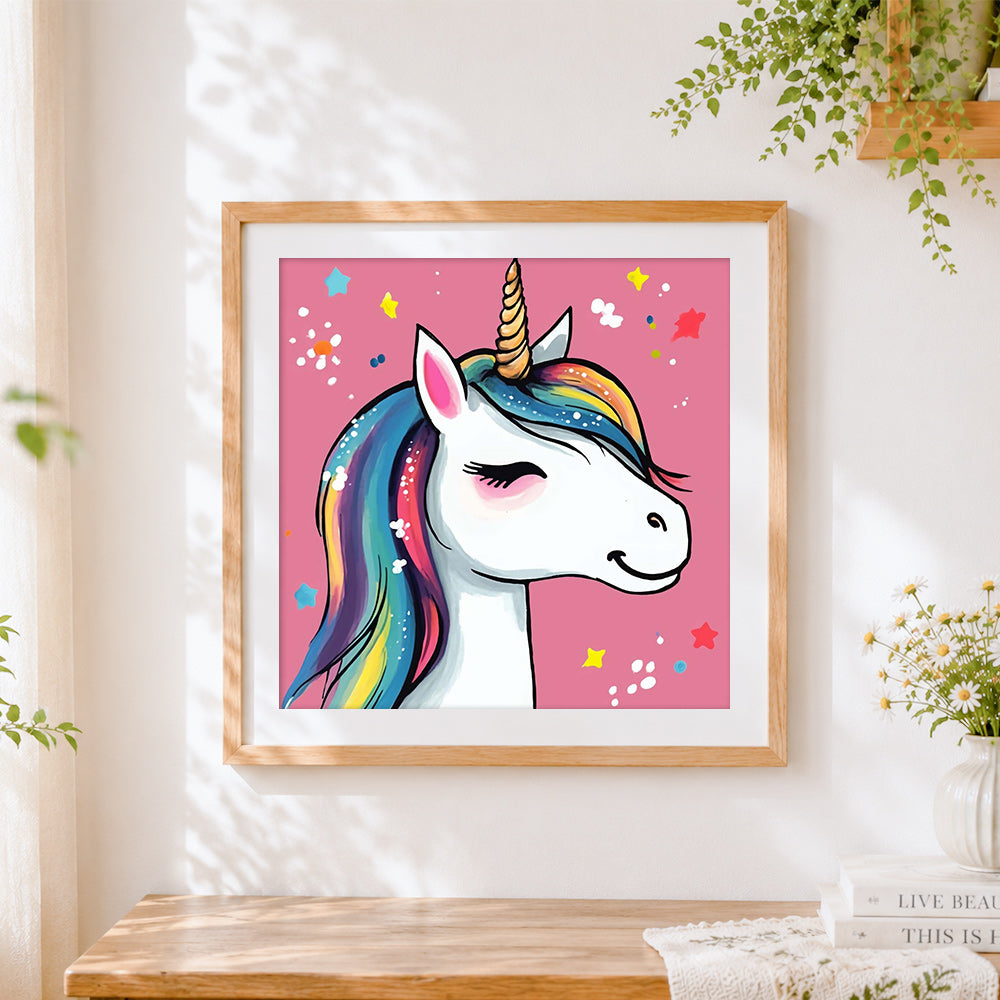 Finished winking rainbow unicorn cross stitch artwork displayed