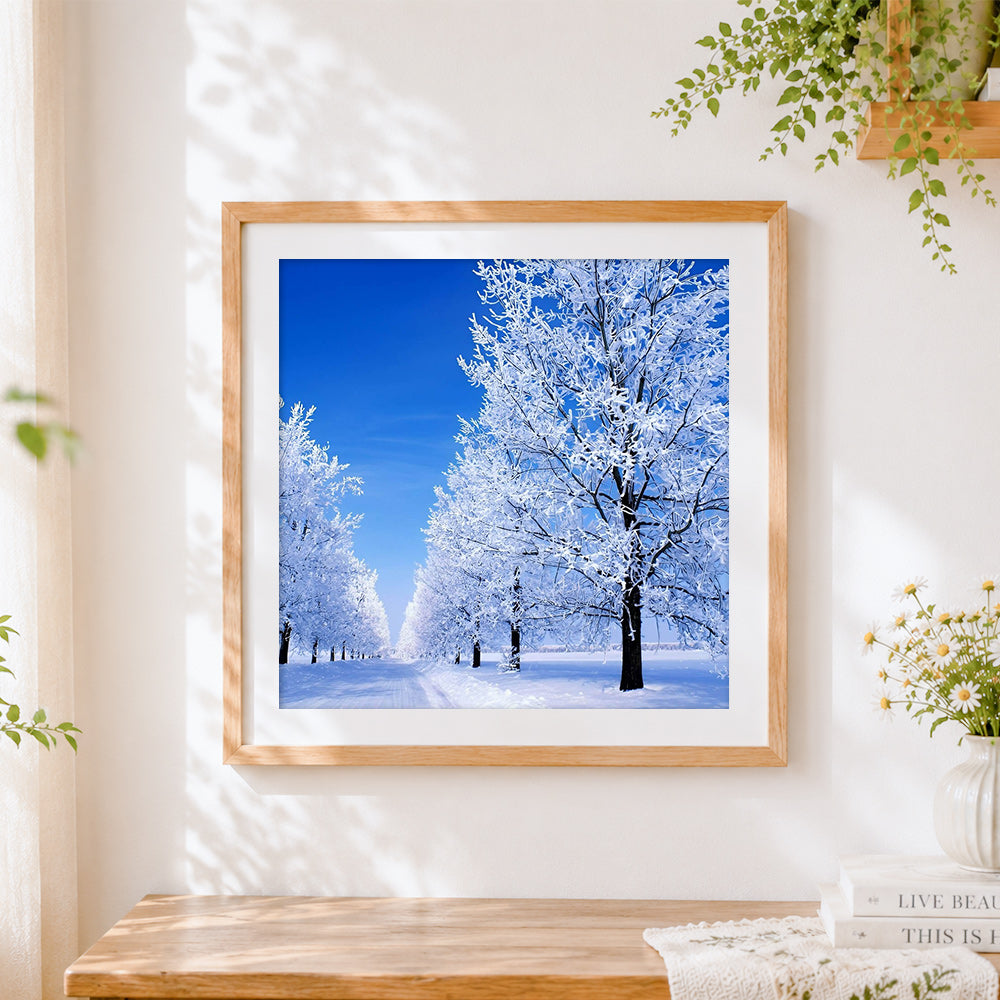 Finished winter frosted tree avenue cross stitch artwork displayed