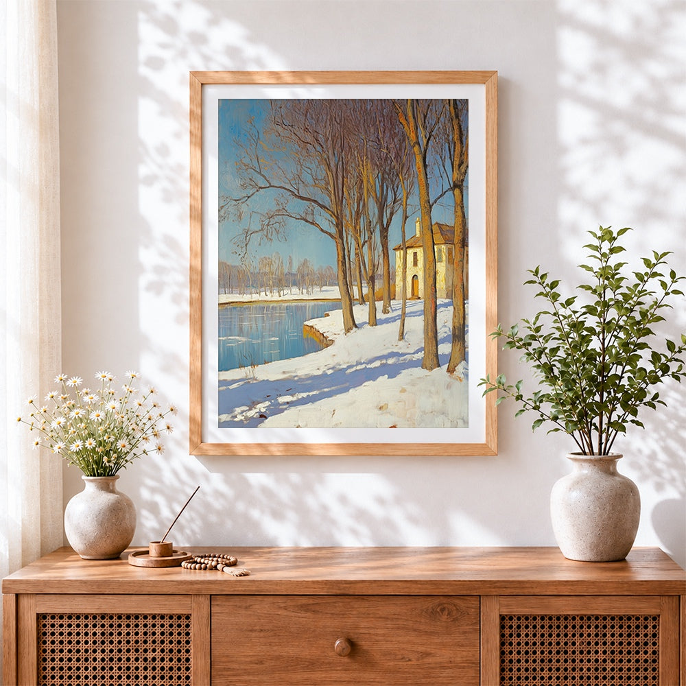 Finished winter riverside cottage cross stitch artwork displayed