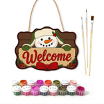 Winter snowman paint by numbers door hanger with paints and brushes