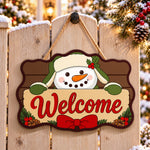 Winter snowman paint by numbers door hanger on a garden gate