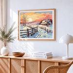 Winter sunset and snowy cabin paint by numbers artwork displayed on wall as home decor