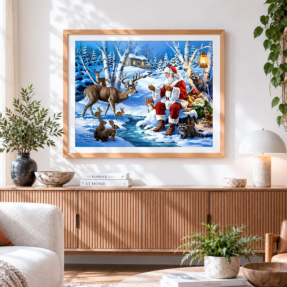 Finished winter woodland santa and animal friends cross stitch artwork displayed
