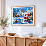 Winter woodland santa and animal friends cross stitch artwork displayed on wall as home decor