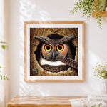 Finished wise owl with glasses cross stitch artwork displayed