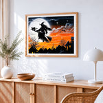 Witch flying on broomstick across the moon cross stitch artwork displayed on wall as home decor