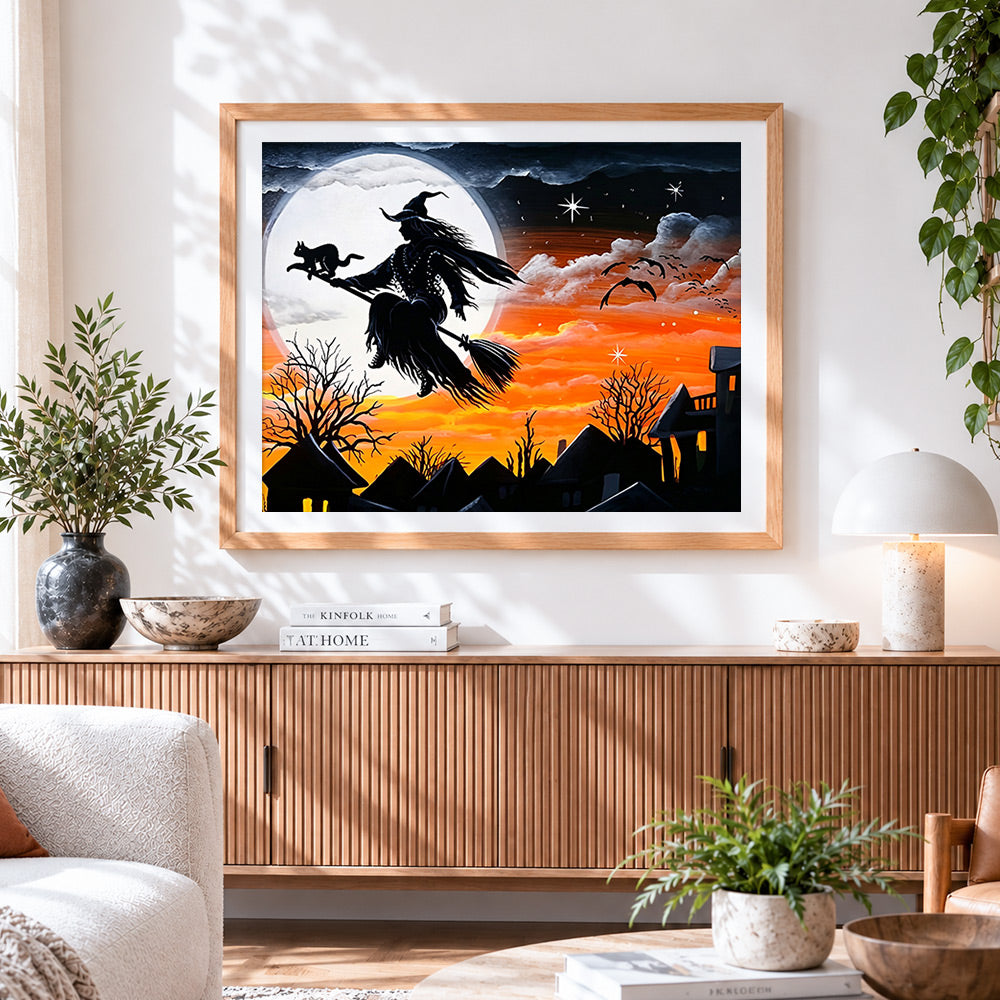 Finished witch flying on broomstick across the moon paint by numbers artwork displayed as home decor