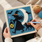 Creating handmade witch silhouette under moon punch needle artwork