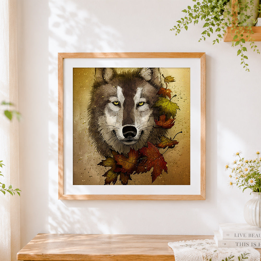 Finished wolf portrait with autumn leaves cross stitch artwork displayed