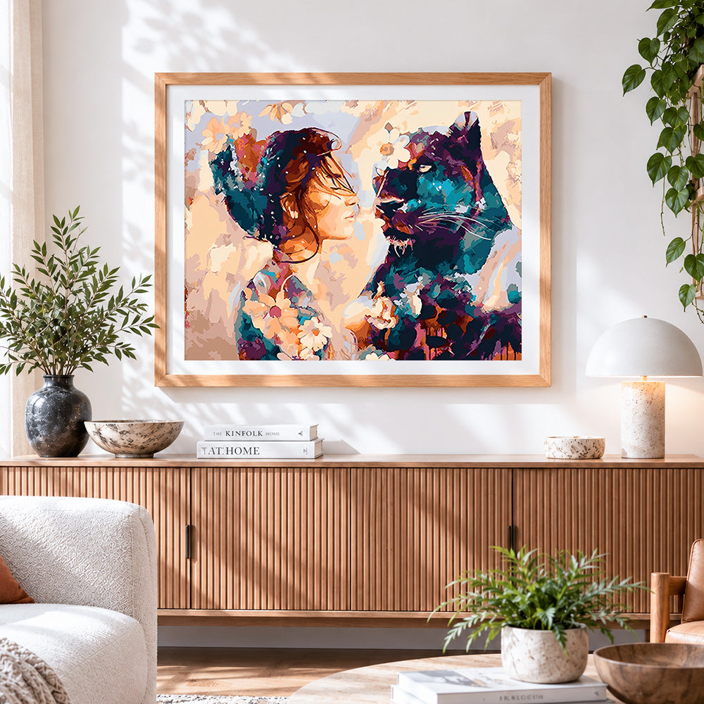 Finished woman and black panther with flowers paint by numbers artwork displayed as home decor
