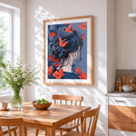 Woman and crimson butterflies cross stitch artwork displayed on wall as home decor