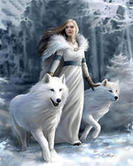 Woman and white wolves in a snowy forest cross stitch kit for beginners