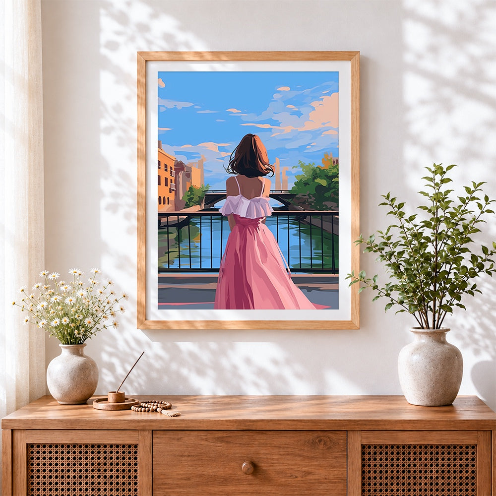 Finished woman at sunset on the canal bridge cross stitch artwork displayed