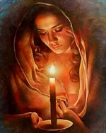 Woman holding a candle cross stitch kit for beginners