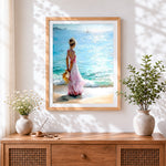 Finished woman in a pink dress by the sea paint by numbers artwork displayed as home decor