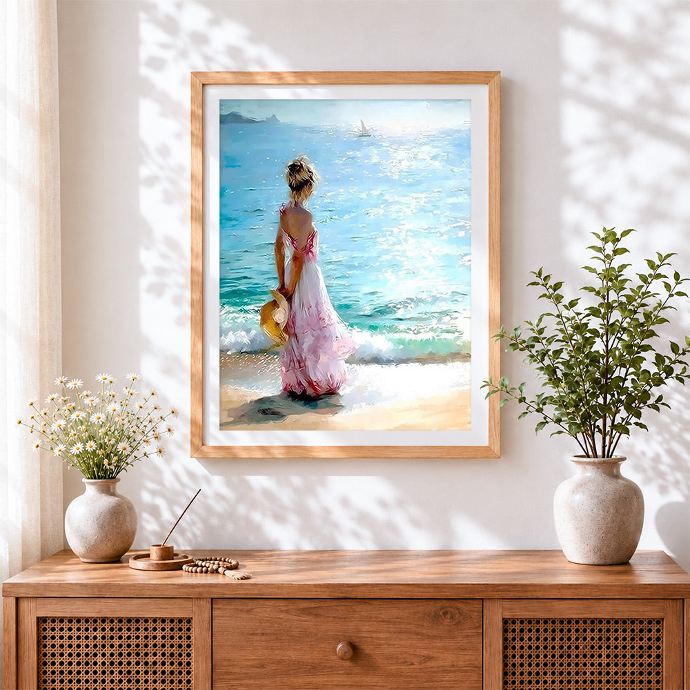 Finished woman in a pink dress by the sea paint by numbers artwork displayed as home decor