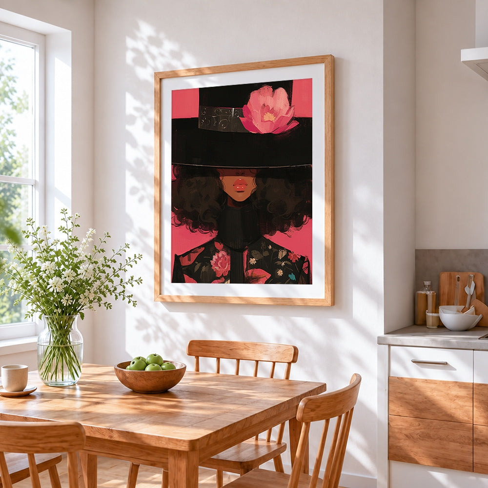 Woman in black hat with pink flower cross stitch artwork displayed on wall as home decor