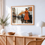 Woman in orange coat in paris paint by numbers artwork displayed on wall as home decor