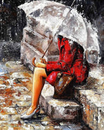 Woman in red coat in the rain cross stitch kit for beginners