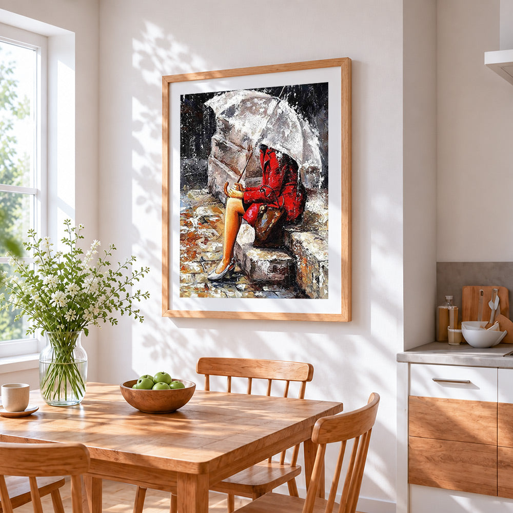 Woman in red coat in the rain cross stitch artwork displayed on wall as home decor