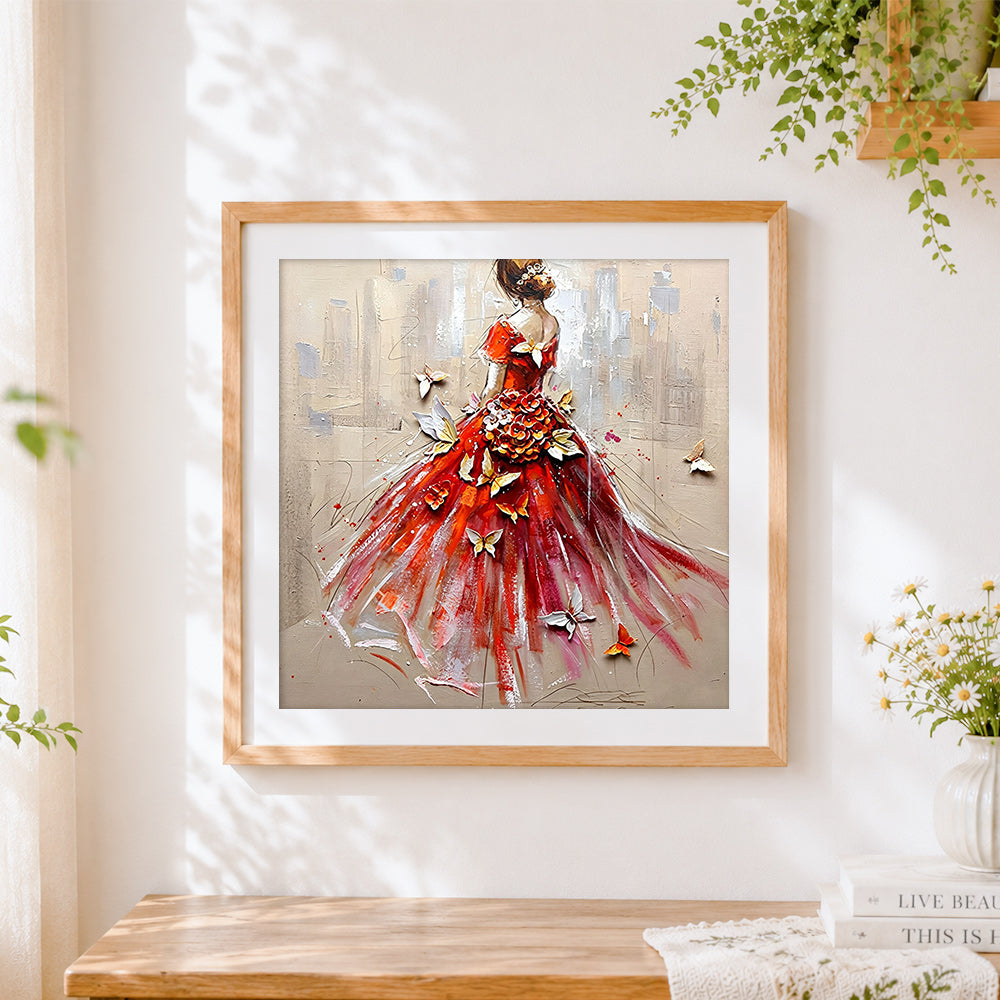 Finished woman in red dress with butterflies cross stitch artwork displayed