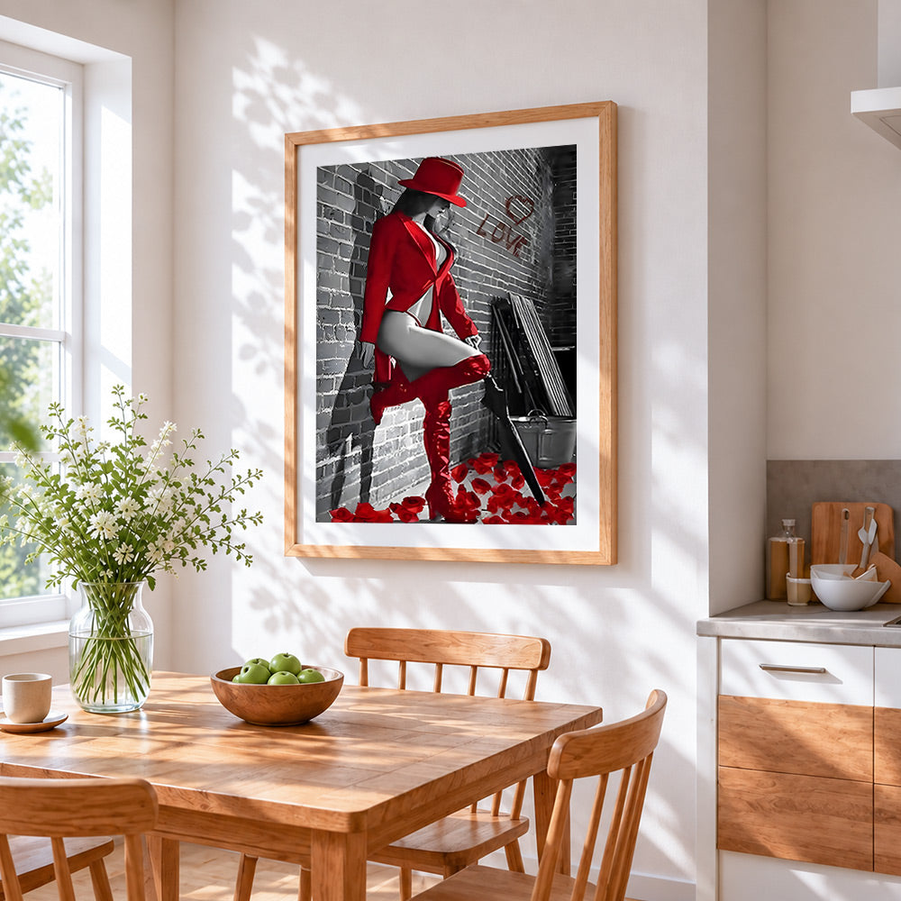 Woman in red hat and boots cross stitch artwork displayed on wall as home decor