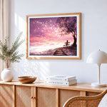 Woman on a bench under cherry blossoms paint by numbers artwork displayed on wall as home decor