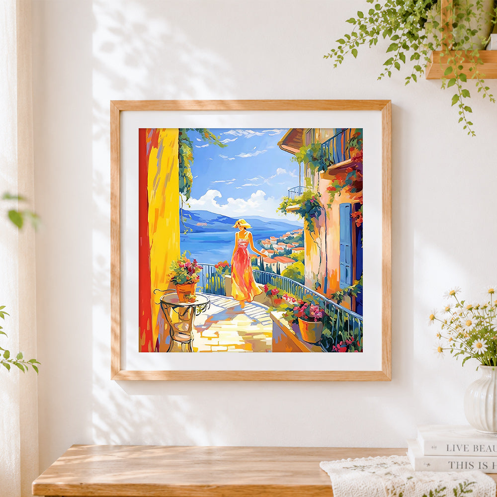 Finished woman on a mediterranean balcony cross stitch artwork displayed