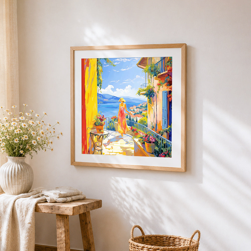 Woman on a mediterranean balcony cross stitch artwork displayed on wall as home decor