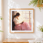 Finished woman reading by the window cross stitch artwork displayed