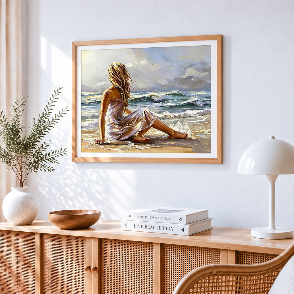 Woman sitting by the sea paint by numbers artwork displayed on wall as home decor