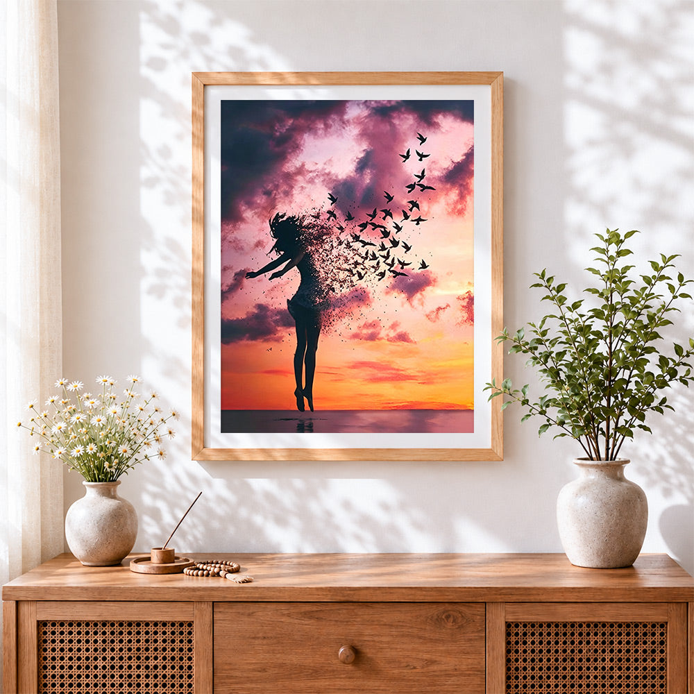 Finished woman turning into birds at sunset paint by numbers artwork displayed as home decor