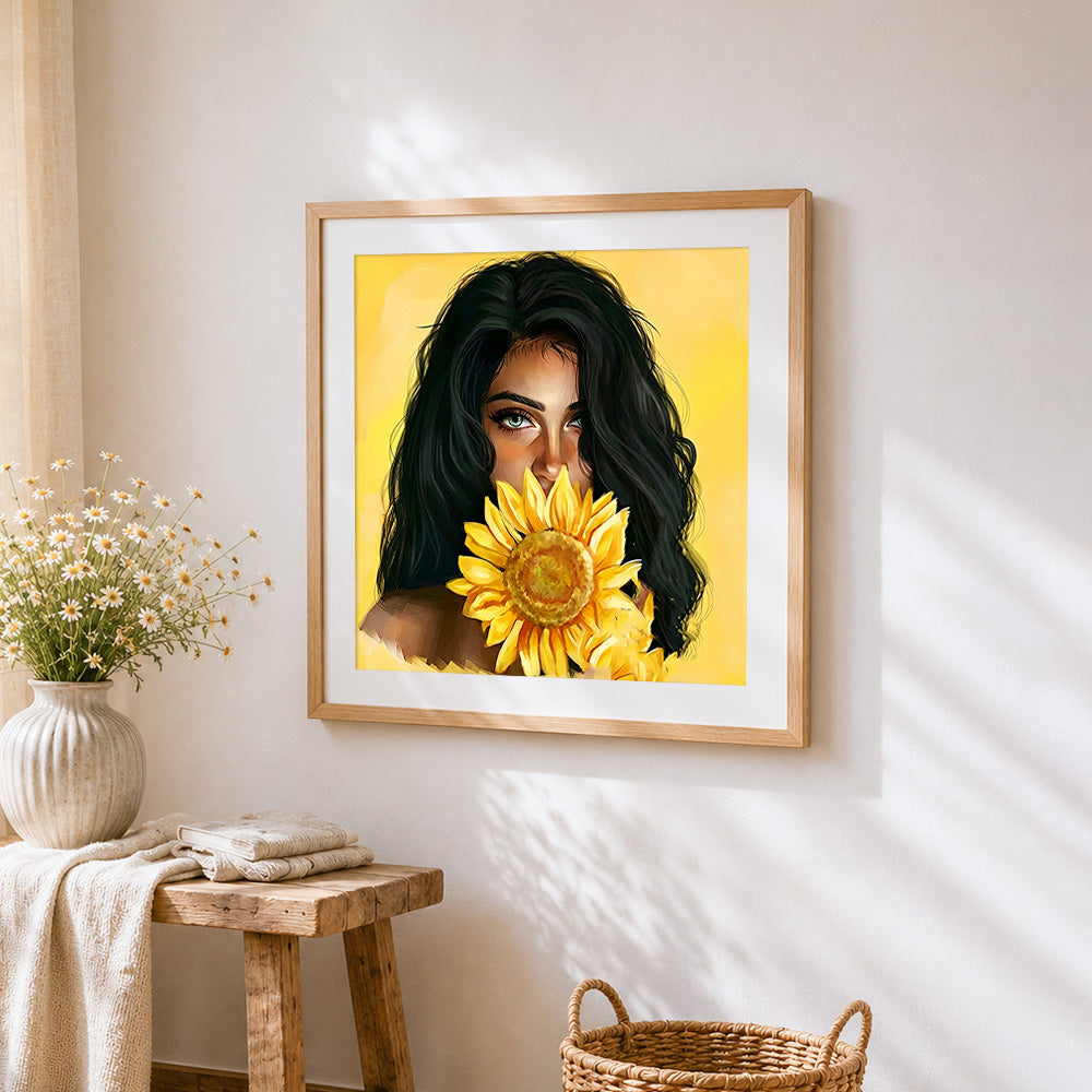 Woman with a sunflower cross stitch artwork displayed on wall as home decor