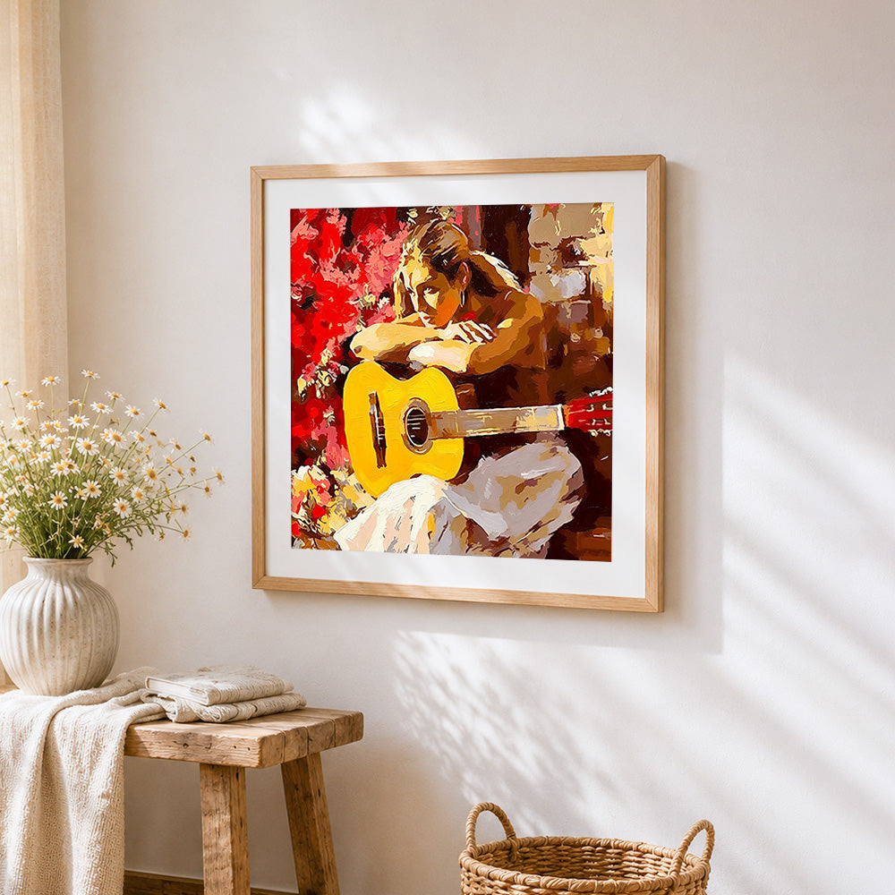 Woman with acoustic guitar cross stitch artwork displayed on wall as home decor