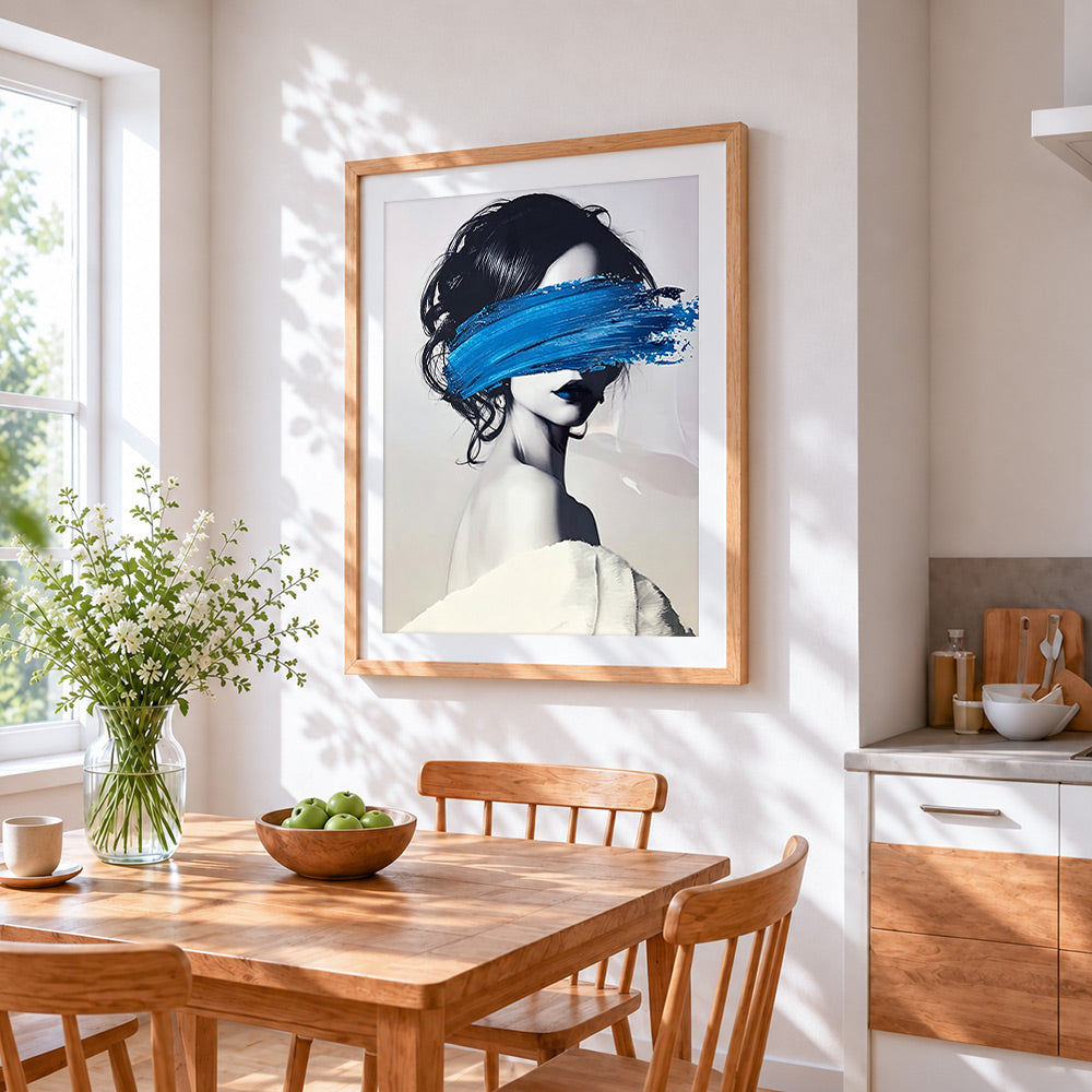 Woman with blue brushstroke cross stitch artwork displayed on wall as home decor