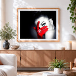 Finished woman with blue eye and red glove paint by numbers artwork displayed as home decor