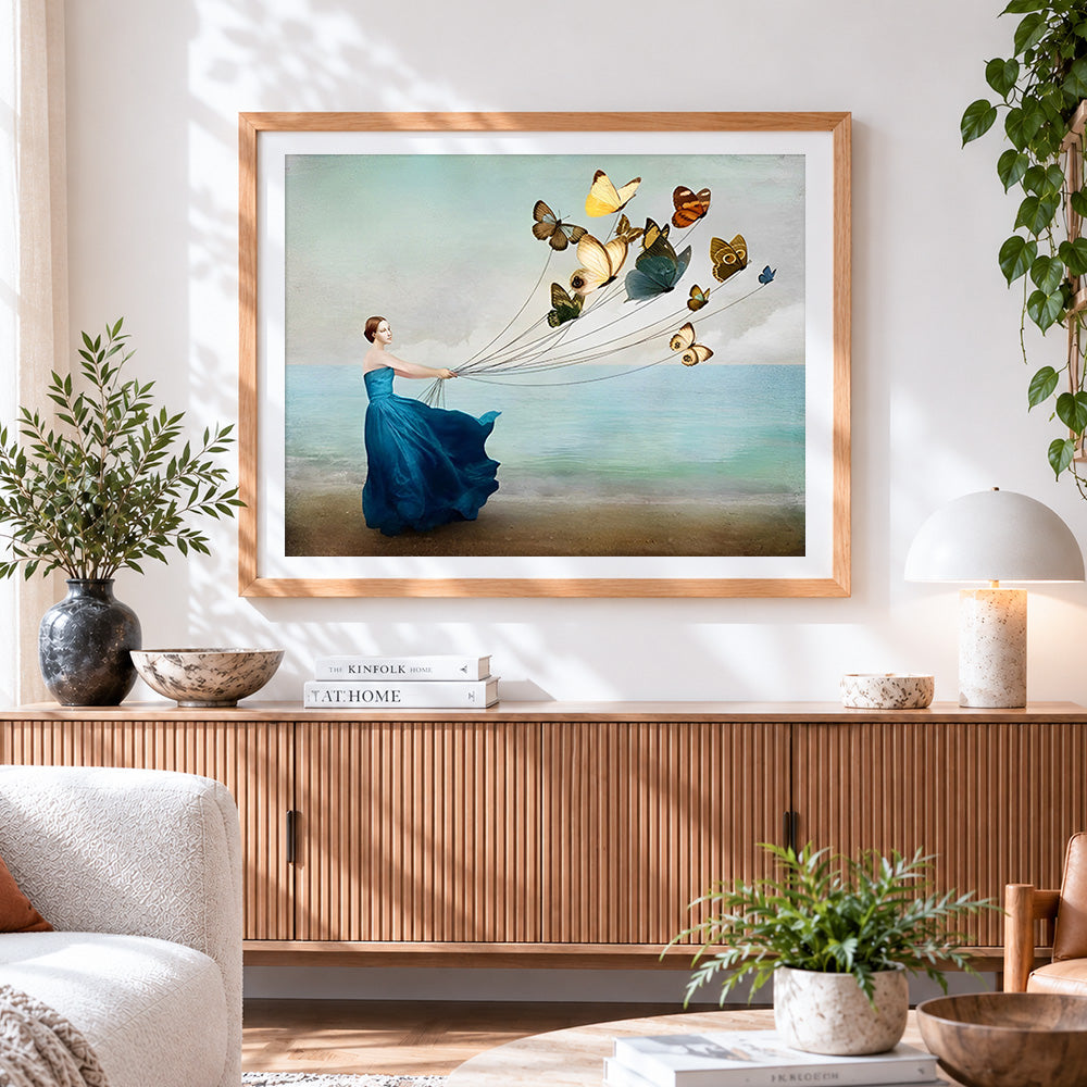 Finished woman with butterfly balloons by the sea paint by numbers artwork displayed as home decor