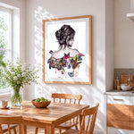 Woman with colourful butterflies on her back cross stitch artwork displayed on wall as home decor