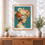 Finished woman with floral headdress cross stitch artwork displayed